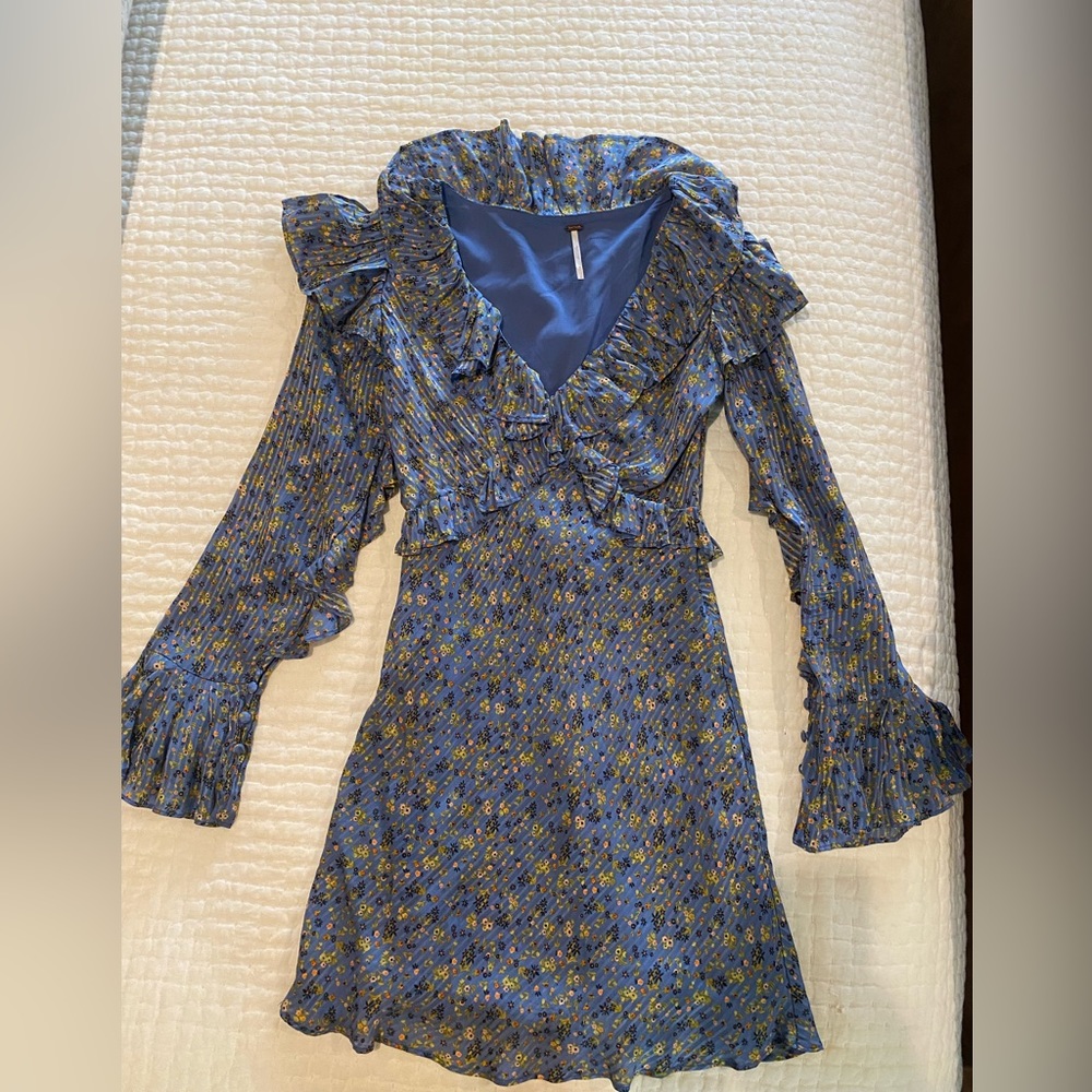 Free People floral Mini Dress with flutter sleeves.